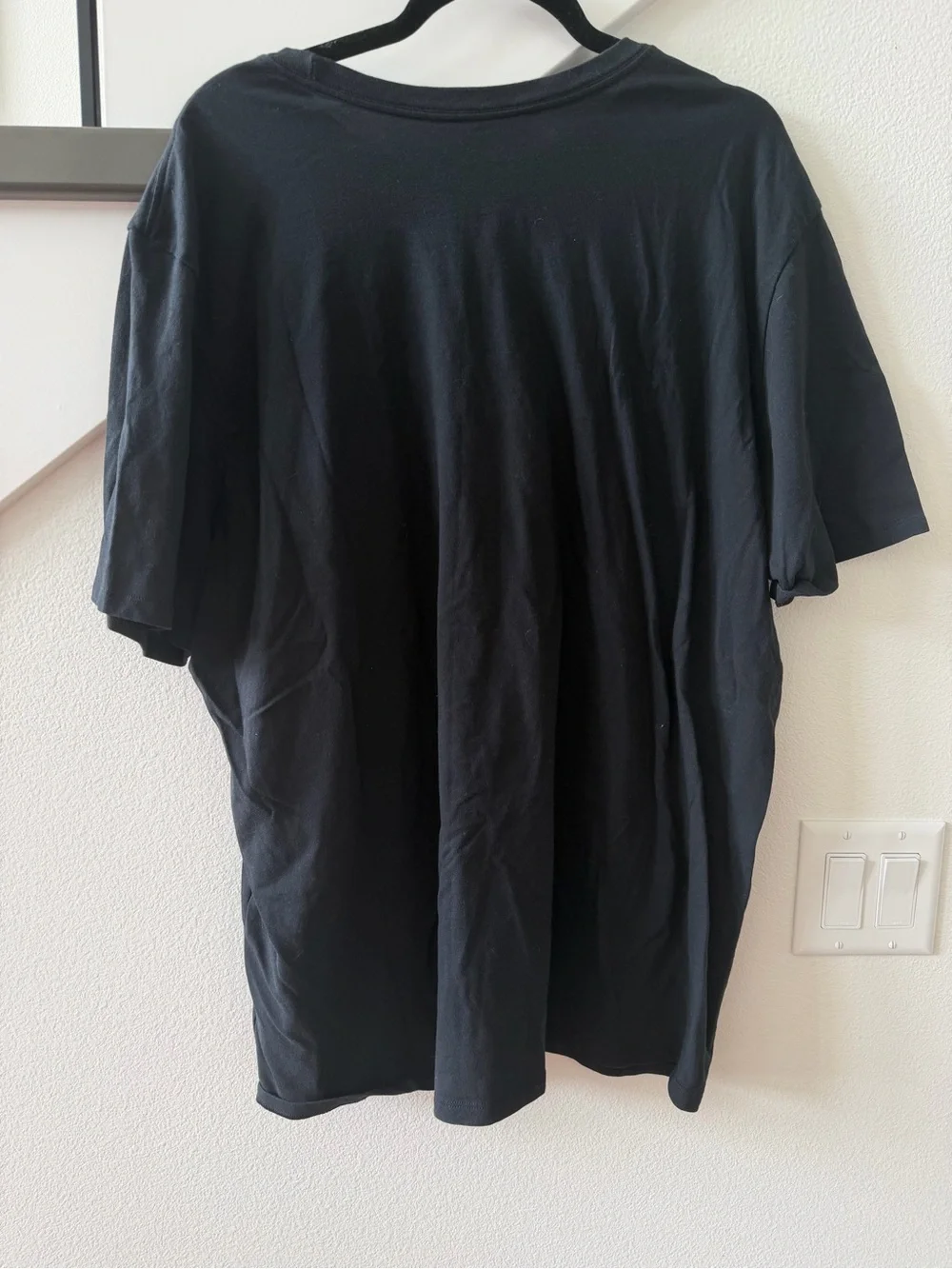 Nike Iowa Hawkeyes Black Short-Sleeve Tee with Yellow Graphic and Swoosh